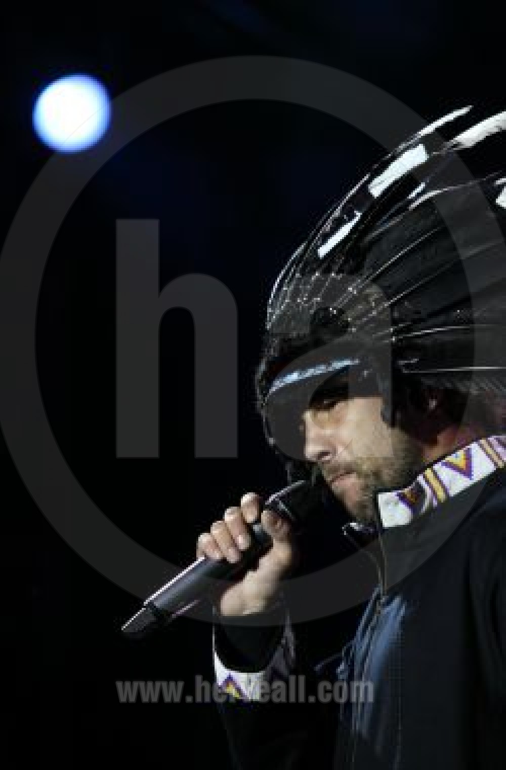 Jamiroquai side portrait in the full moon