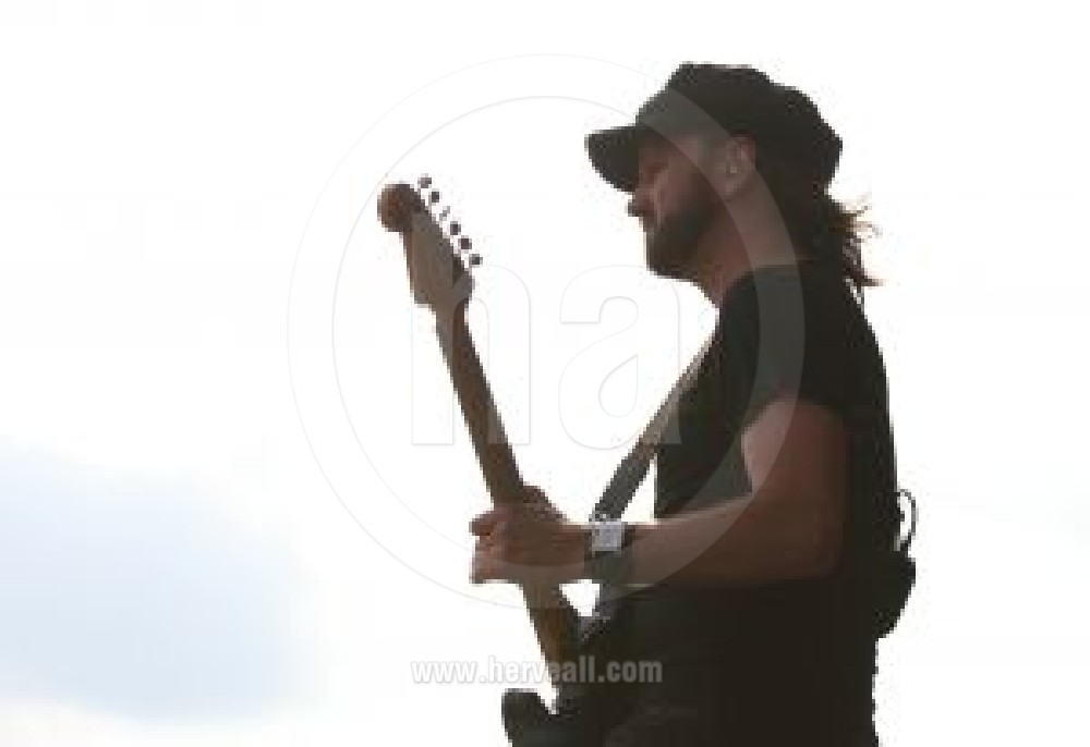 Tim Christensen portrait with guitar